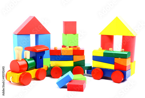 Photo: Colorful wooden toy train isolated on white background Colorful wooden toy train isolated on white background