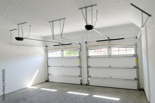 Photo: Residential house two car garage interior Residential house two car garage interior