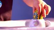 Kid playing Easter eggs close-up