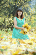 woman with heavy-handed of maple leaves woman with heavy-handed of maple leaves