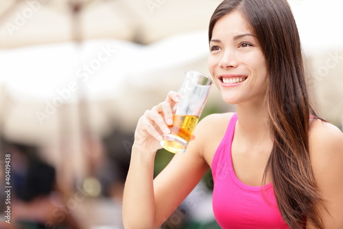 Photo: Woman on cafe drinking drink Woman on cafe drinking drink
