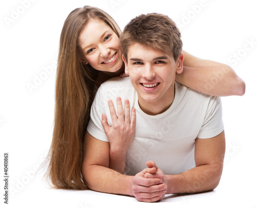 Photo: Young couple isolated on white background Young couple isolated on white background