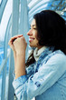 attractive girl in denim jacket in modern building attractive girl in denim jacket in modern building