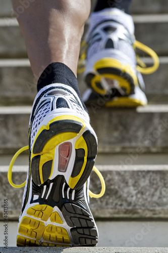 Photo: Athlete running stairs Athlete running stairs