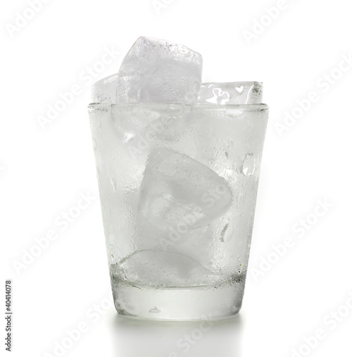 Photo: Glass of ice cubes isolated on white background Glass of ice cubes isolated on white background
