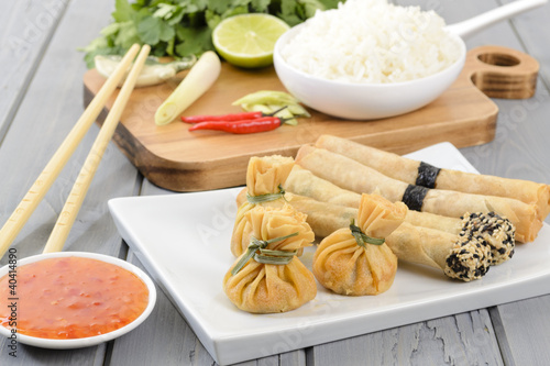 Photo: Oriental Snacks - wontons and spring rolls & sweet chilli sauce Oriental Snacks - wontons and spring rolls & sweet chilli sauce