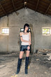Photo: Girl with Problems in Ruined House Girl with Problems in Ruined House