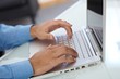 Closeup hands typing