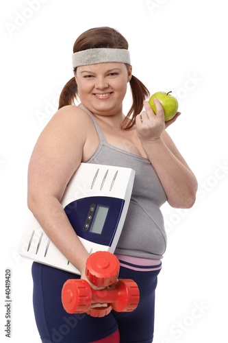 Photo: Happy fat woman dieting Happy fat woman dieting