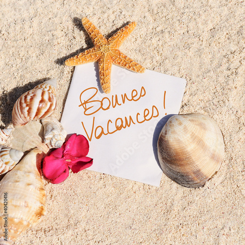 Foto: Blank paper beach sand starfish shells summer Blank paper beach sand starfish shells summer
