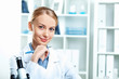 Foto: Young scientist working in laboratory Young scientist working in laboratory