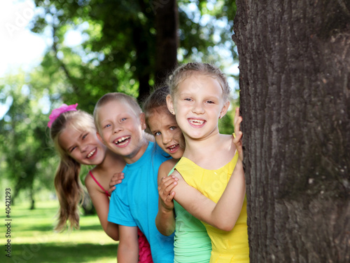 Photo: Children playing in the summer park Children playing in the summer park