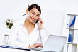 Young woman in business wear in office