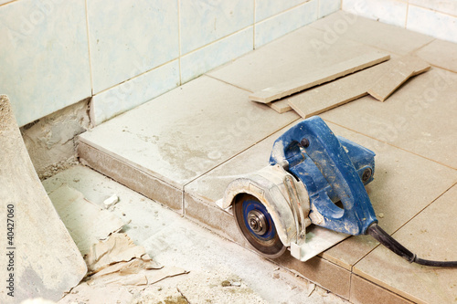 Photo: Laying floor tiles for house renovation Laying floor tiles for house renovation