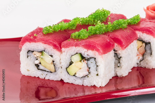 Photo: Maki Sushi - Roll made of Crab, avocado, cucumber inside. Fresh Maki Sushi - Roll made of Crab, avocado, cucumber inside. Fresh