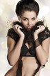 sexy woman in black underwear with feathers
