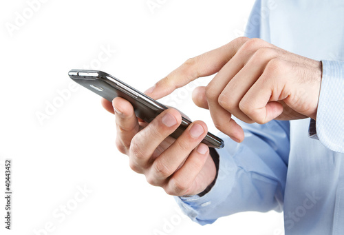 Photo: Close up of man using smart phone isolated on white background Close up of man using smart phone isolated on white background