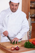 chef chopping herbs
