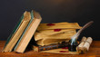 old books, scrolls, feather pen and inkwell old books, scrolls, feather pen and inkwell