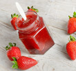 strawberries marmalade on a wooden table