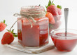 strawberries marmalade on a wooden table