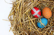 Photo: Three Easter eggs in the nest Three Easter eggs in the nest