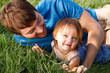 Photo: Happy Father And Daughter Laying In Grass Happy Father And Daughter Laying In Grass