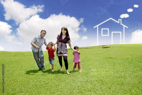 Photo: Young Asian Family with their dream house Young Asian Family with their dream house