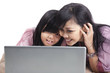 Photo: Mother and daughter surfing the net Mother and daughter surfing the net