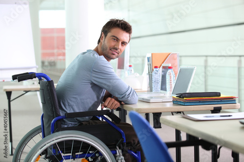 Photo: Businessman in a wheelchair Businessman in a wheelchair