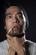 Head shot of a sick smoker