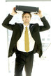 Man holding a briefcase on his head. 