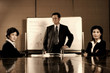 Business people in meeting room. 