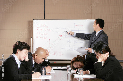 Photo: A man teaching while the others sleeping. A man teaching while the others sleeping.