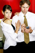 Woman seducing man in the kitchen. 