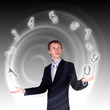Business man juggling with numbers and symbols