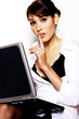 Foto: Woman with her finger on her lips. Woman with her finger on her lips.