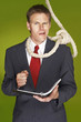 Businessman feeling uncomfortable with a rope hanging around his neck. 