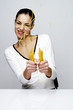 Woman breaking dry spaghetti.