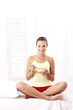 Woman enjoying a bowl of breakfast cereal.
