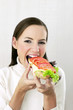 Woman eating a specially made croissant.