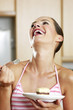 Woman eating cake.