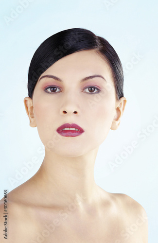 Photo: Portrait of a woman with makeup. Portrait of a woman with makeup.
