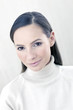Woman smiling at the camera.
