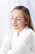 Woman closing her eyes.