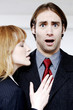 Businesswoman seducing her colleague.