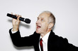 Businessman belting out a song.