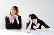 Businesswomen feeling lazy.