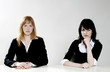Businesswomen posing for the camera.
