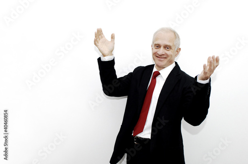 Photo: Businessman posing for the camera. Businessman posing for the camera.